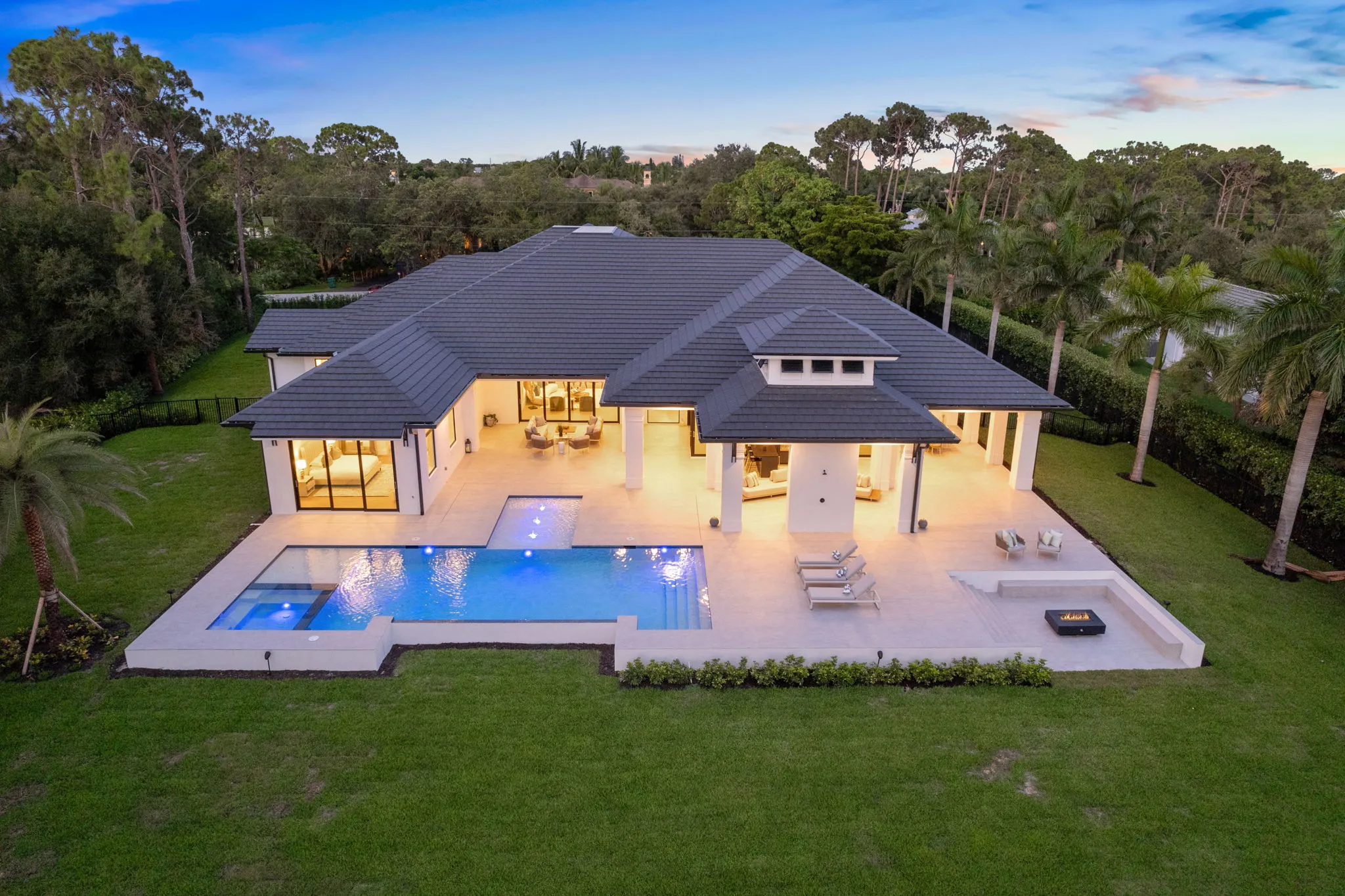Pine Ridge Estates Residence III: aerial rear twilight