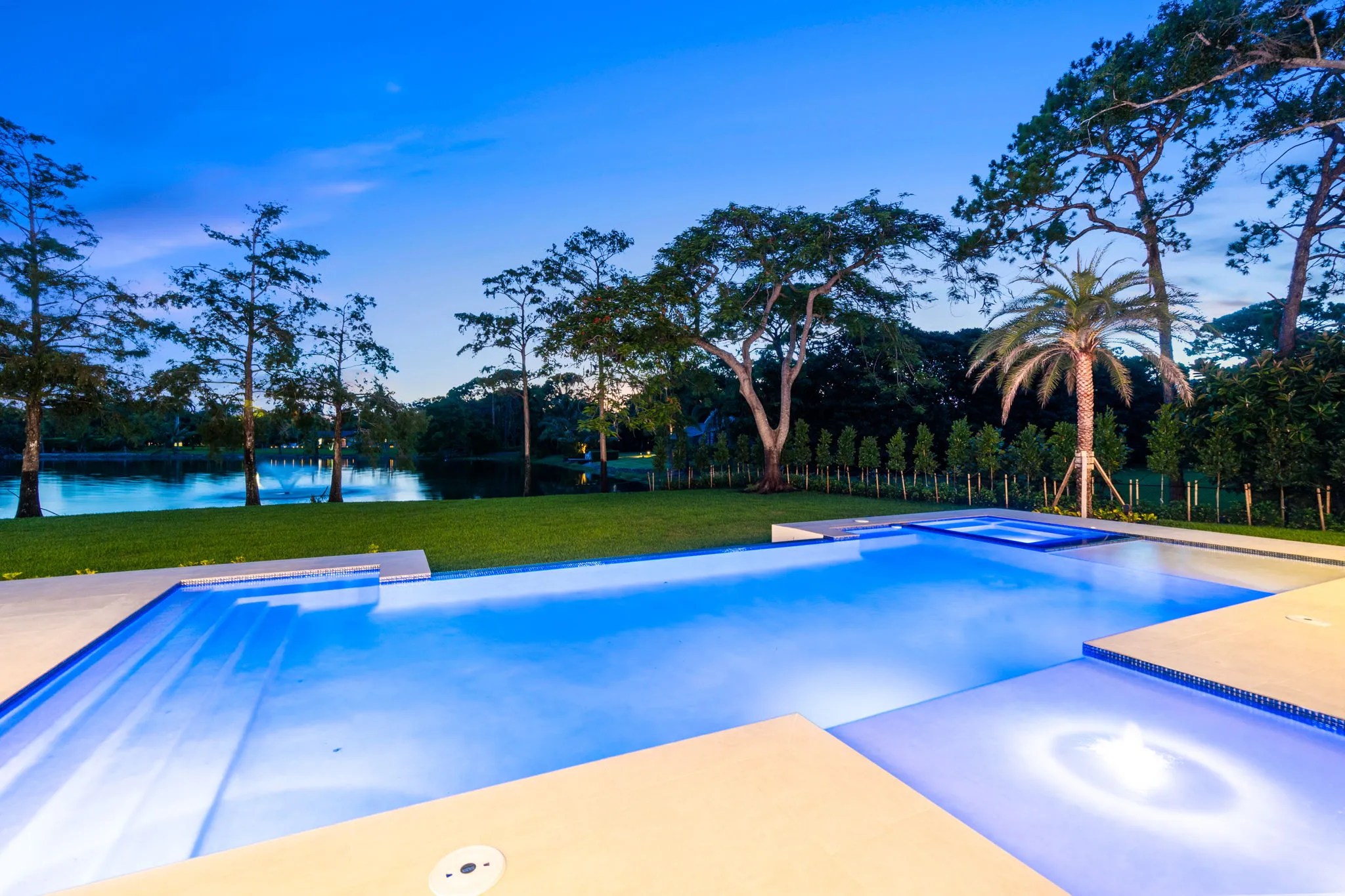 Pine Ridge Estates Residence III: pool twilight lake