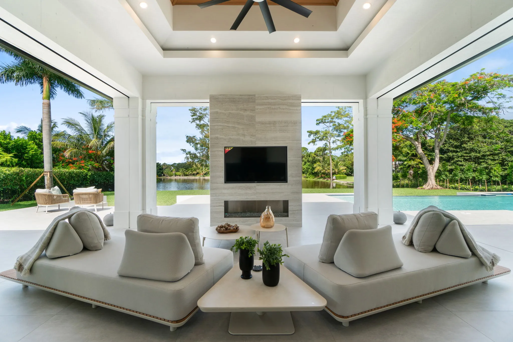 Pine Ridge Estates Residence III: lanai fireplace day