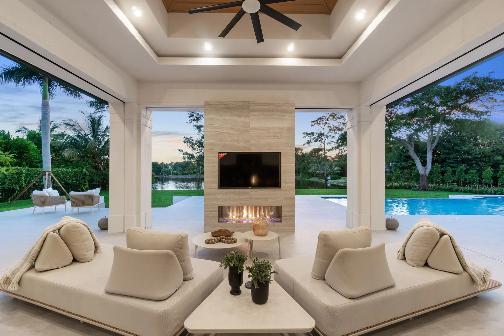 Pine Ridge Estates Residence III: lanai fireplace fire lit
