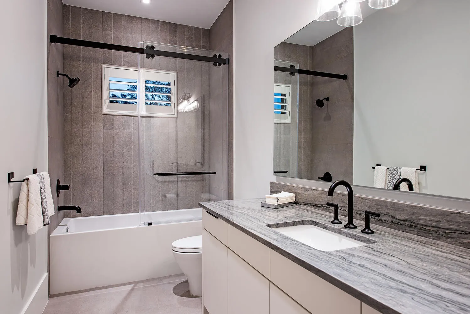 Coach House Lane Residence III: guest bath one night